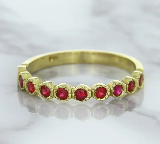 0.30ctw Round Ruby Ring in 14K Yellow Gold