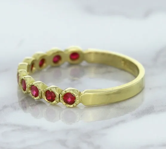 0.30ctw Round Ruby Ring in 14K Yellow Gold