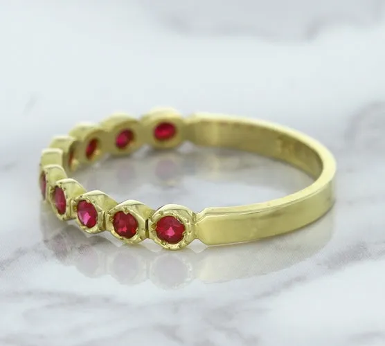 0.30ctw Round Ruby Ring in 14K Yellow Gold
