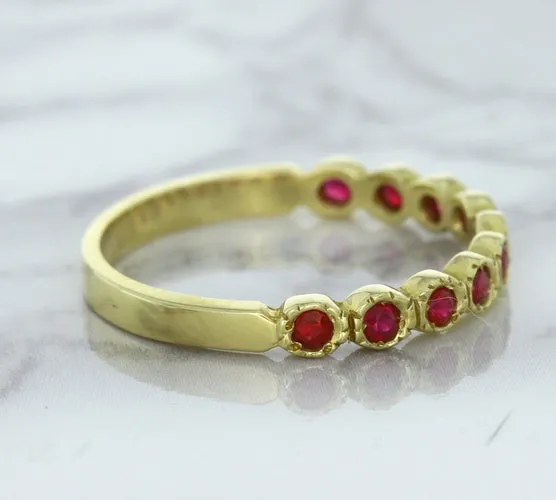 0.30ctw Round Ruby Ring in 14K Yellow Gold