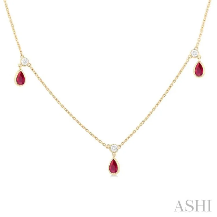 5x3 MM Pear Shape Ruby and 1/8 ctw Round Cut Diamonds Precious Station Necklace in 10K Yellow Gold