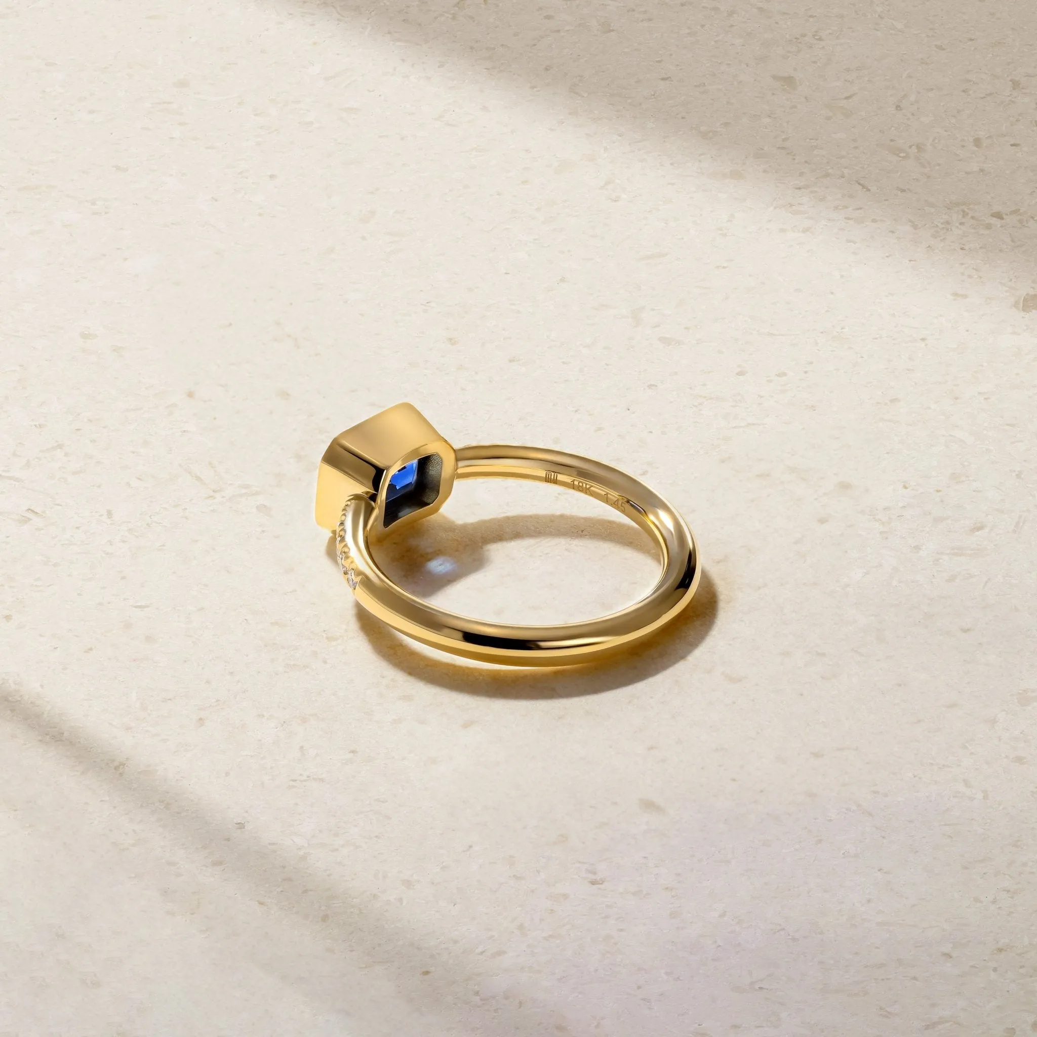 East-West Emerald Cut Sapphire and Diamond Bezel Ring