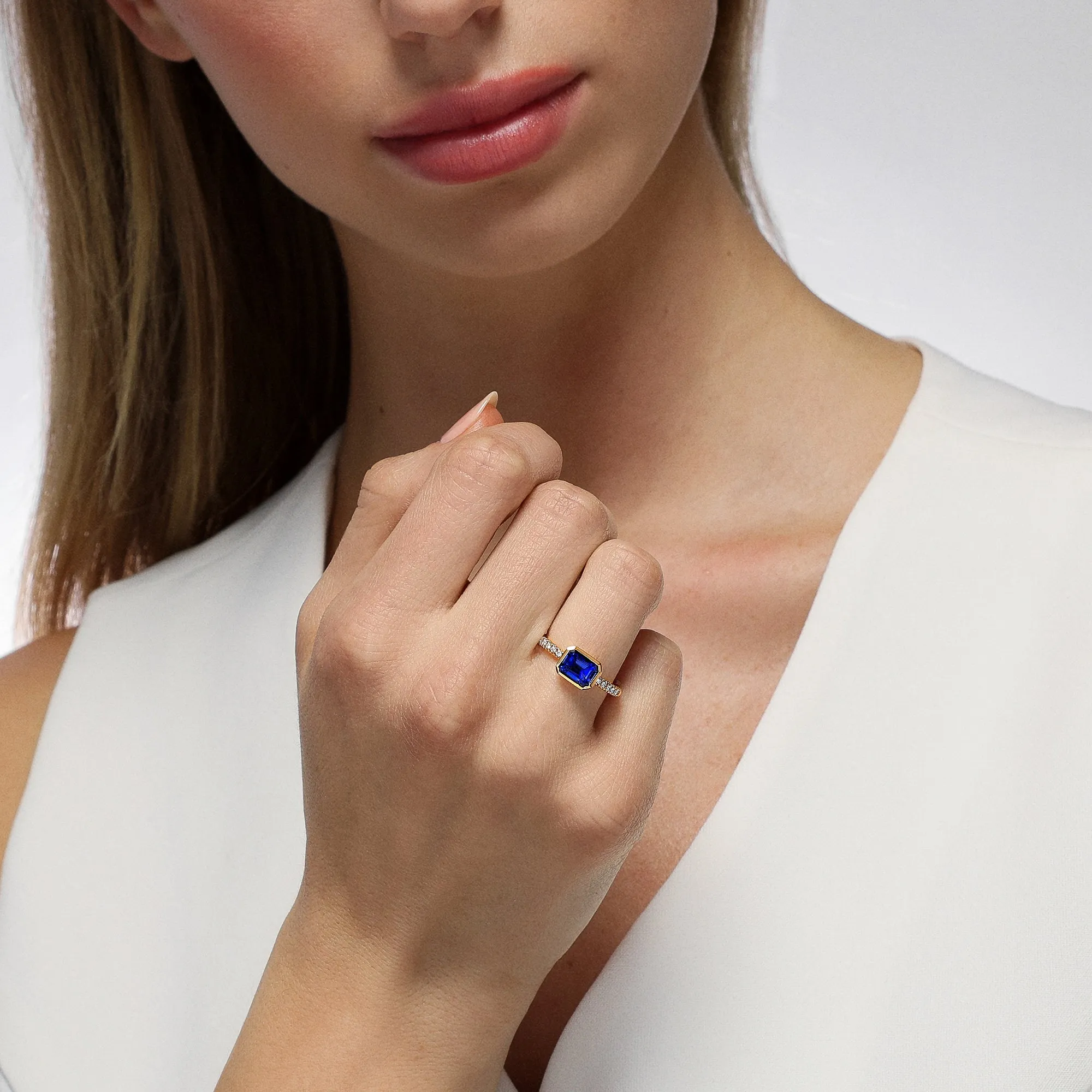 East-West Emerald Cut Sapphire and Diamond Bezel Ring