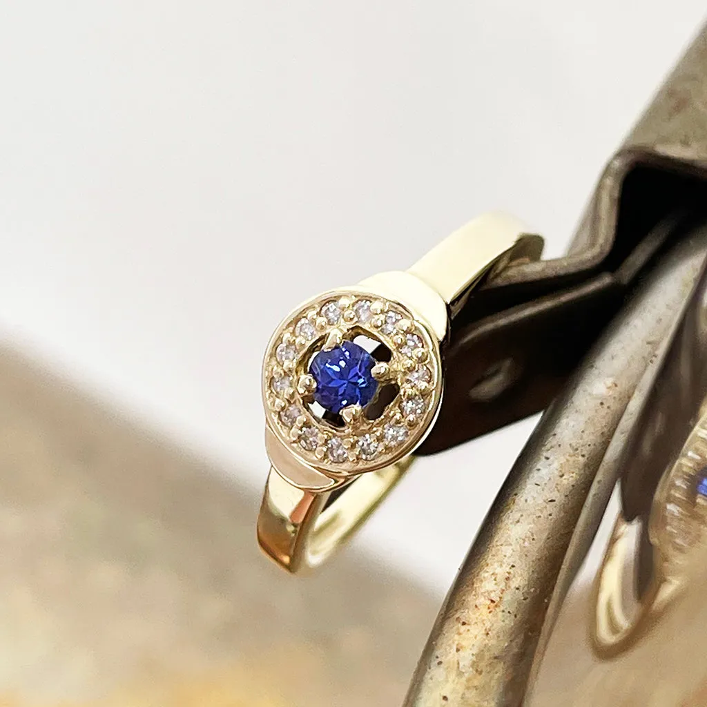 Regally Elevated Tanzanite Diamond Halo Yellow Gold Ring