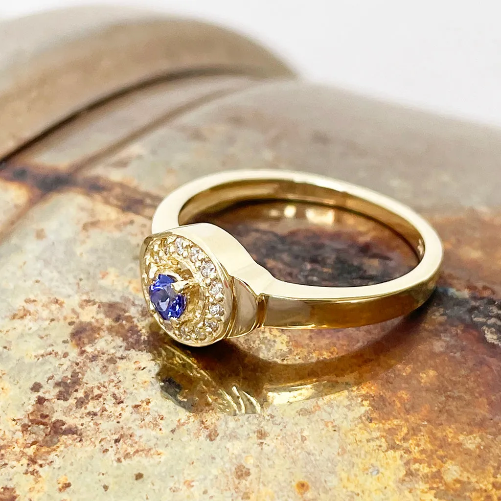 Regally Elevated Tanzanite Diamond Halo Yellow Gold Ring