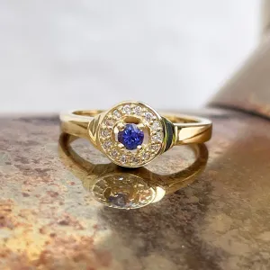 Regally Elevated Tanzanite Diamond Halo Yellow Gold Ring