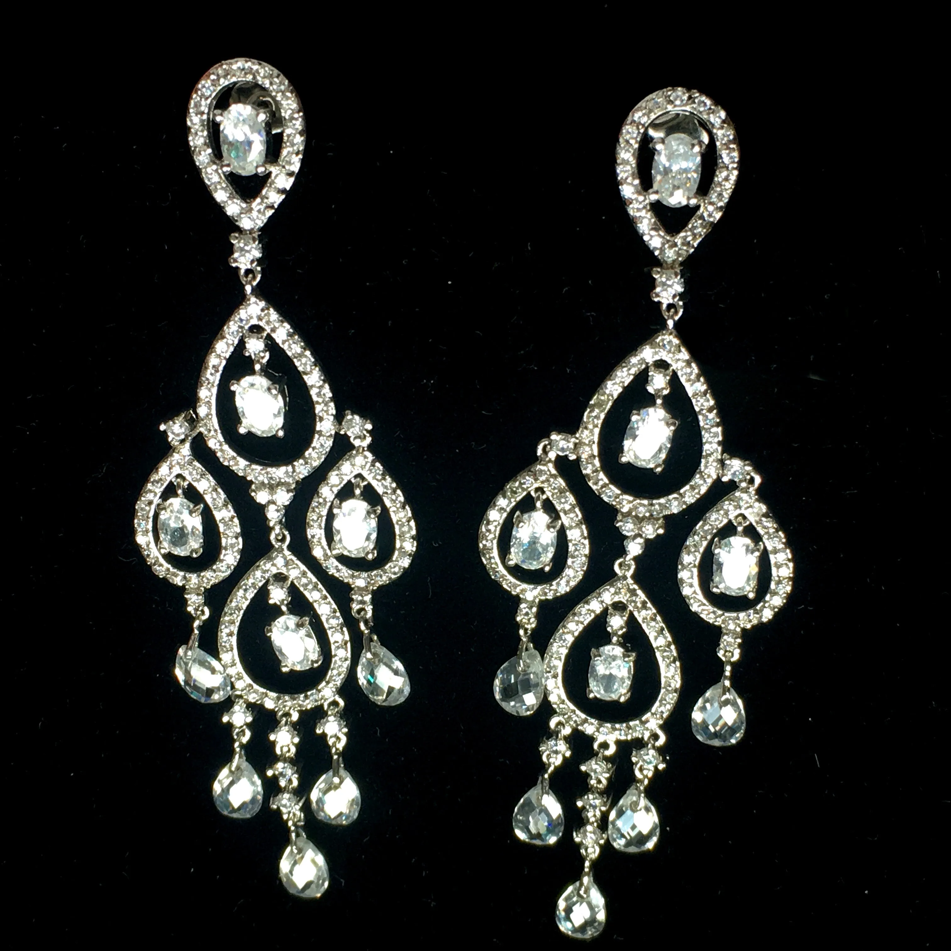 Rhodium Plated Chandelier Earrings with Dangling Oval and Pear Shaped CZs