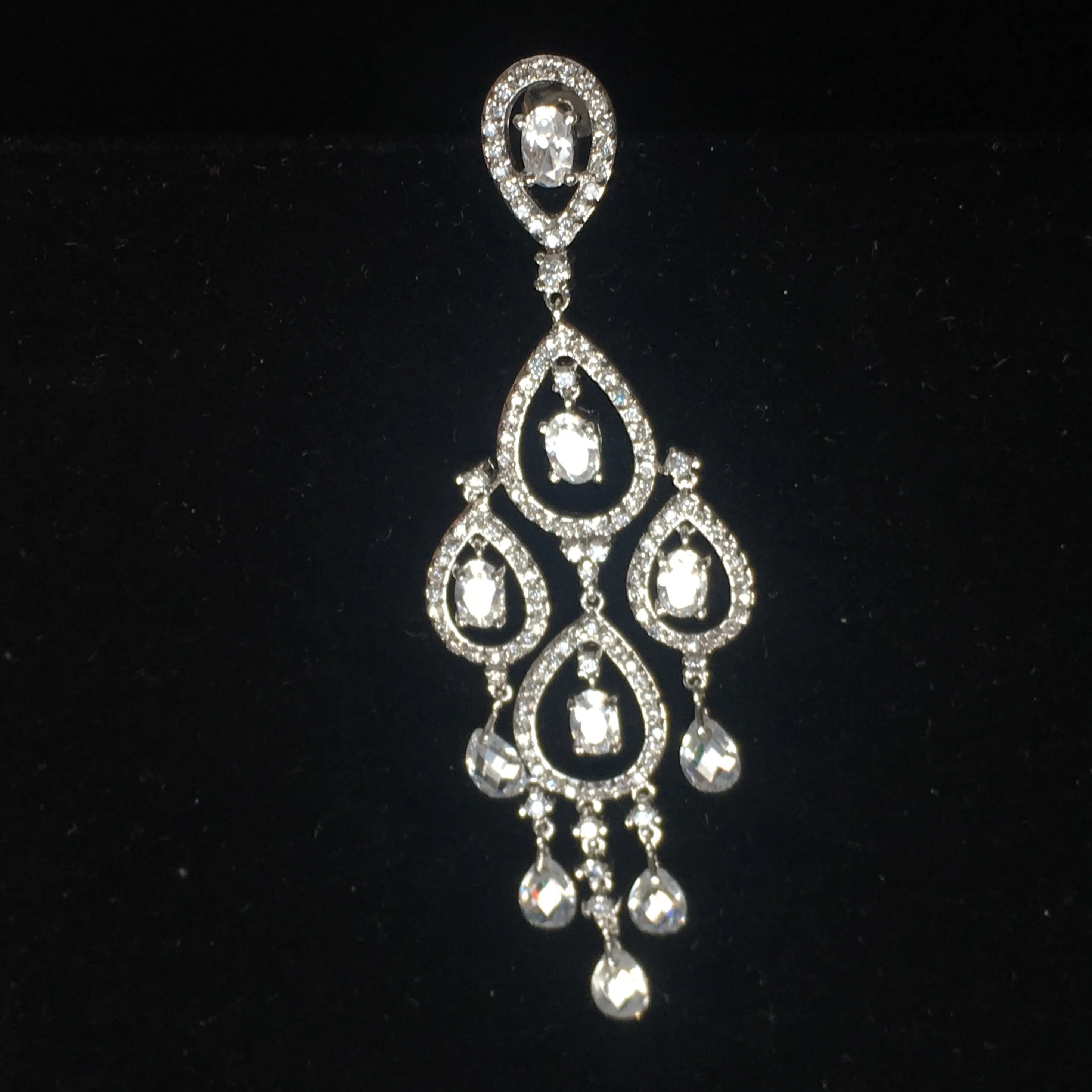 Rhodium Plated Chandelier Earrings with Dangling Oval and Pear Shaped CZs