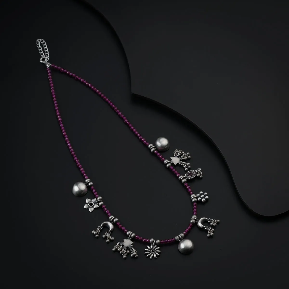 Silver Charms Motifs Necklace with Ruby